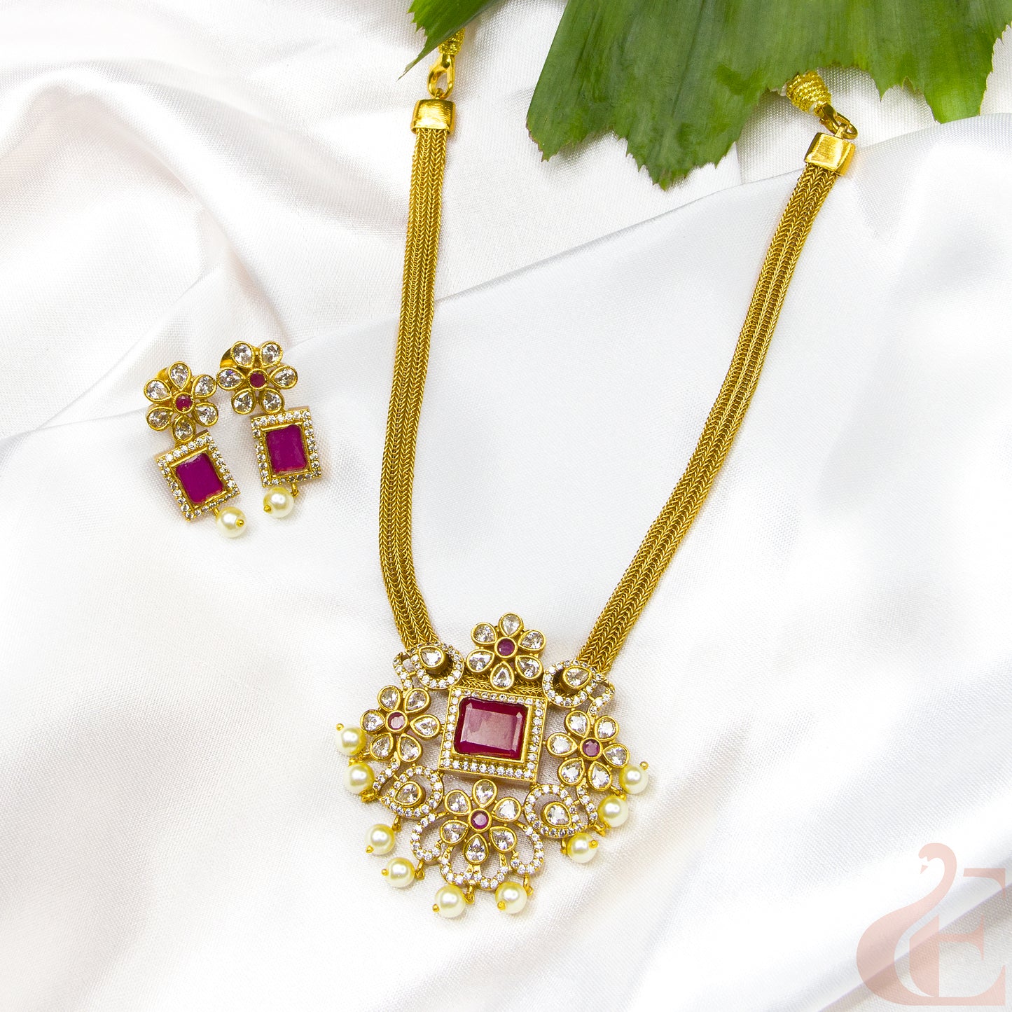 Top side view of AD_Ruby_Studded Antique Necklace_with matching earrings