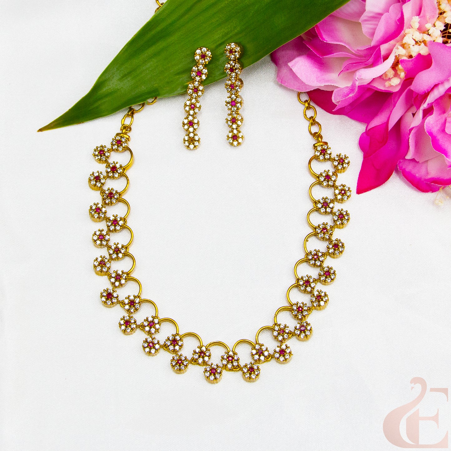 Top view of AD Stone Gold Plated Necklace & Earrings , ruby white stones