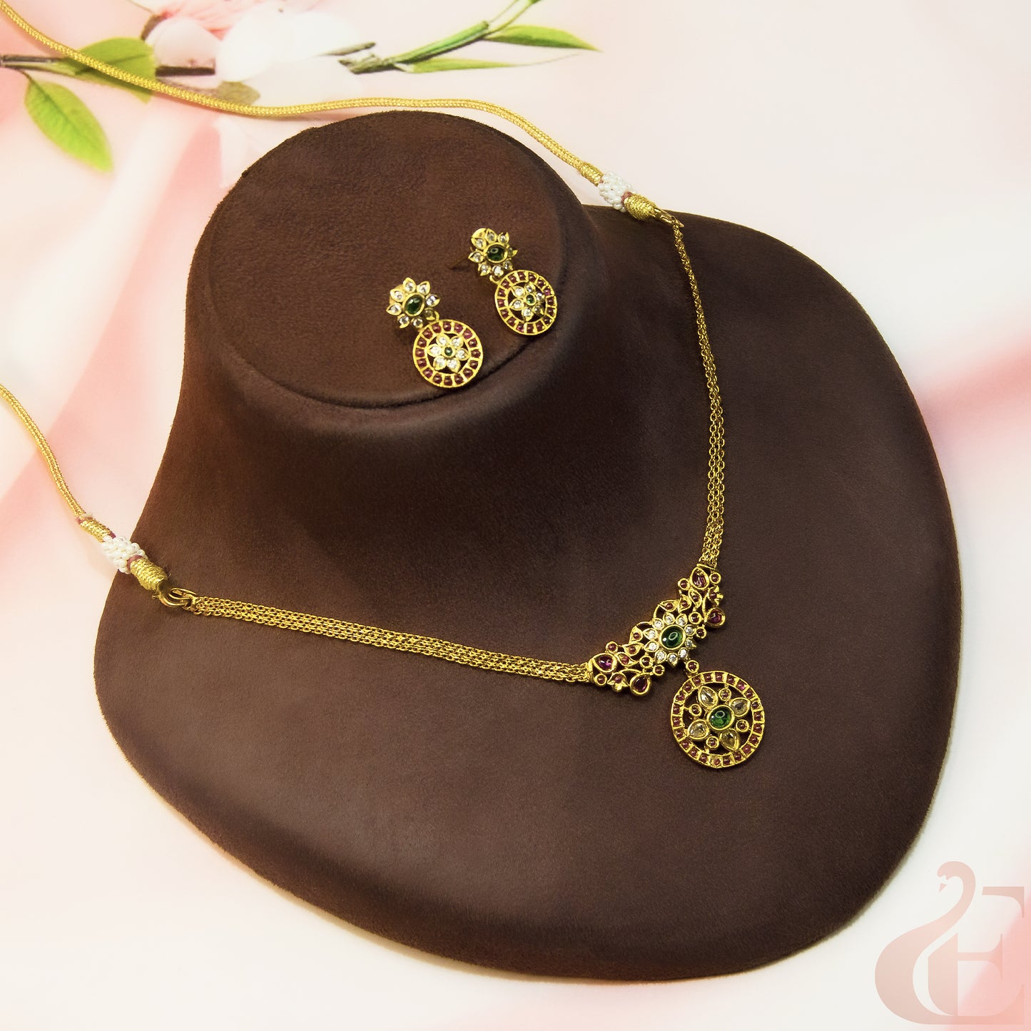 Top view of Antique Necklace & Earrings Ruby green white stones