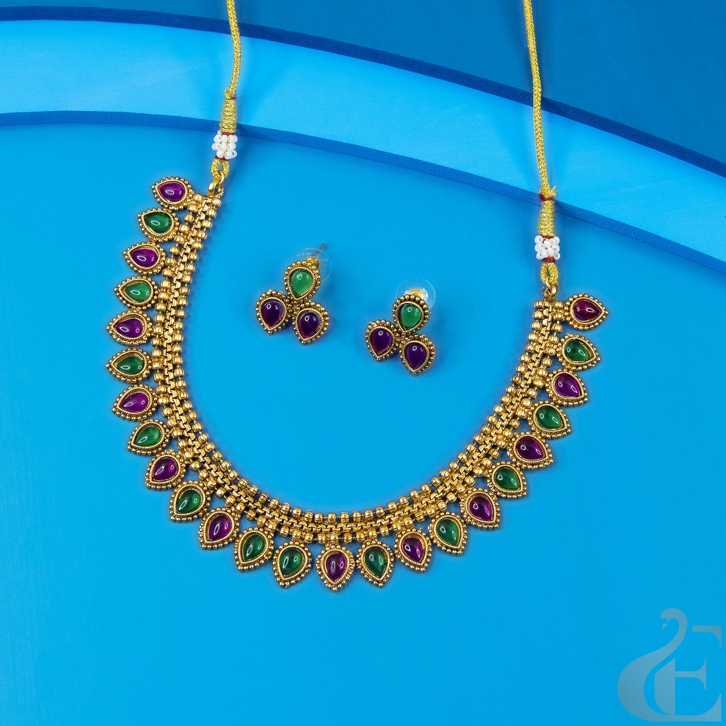 Top view of Antique Necklace & Earrings Ruby green stones