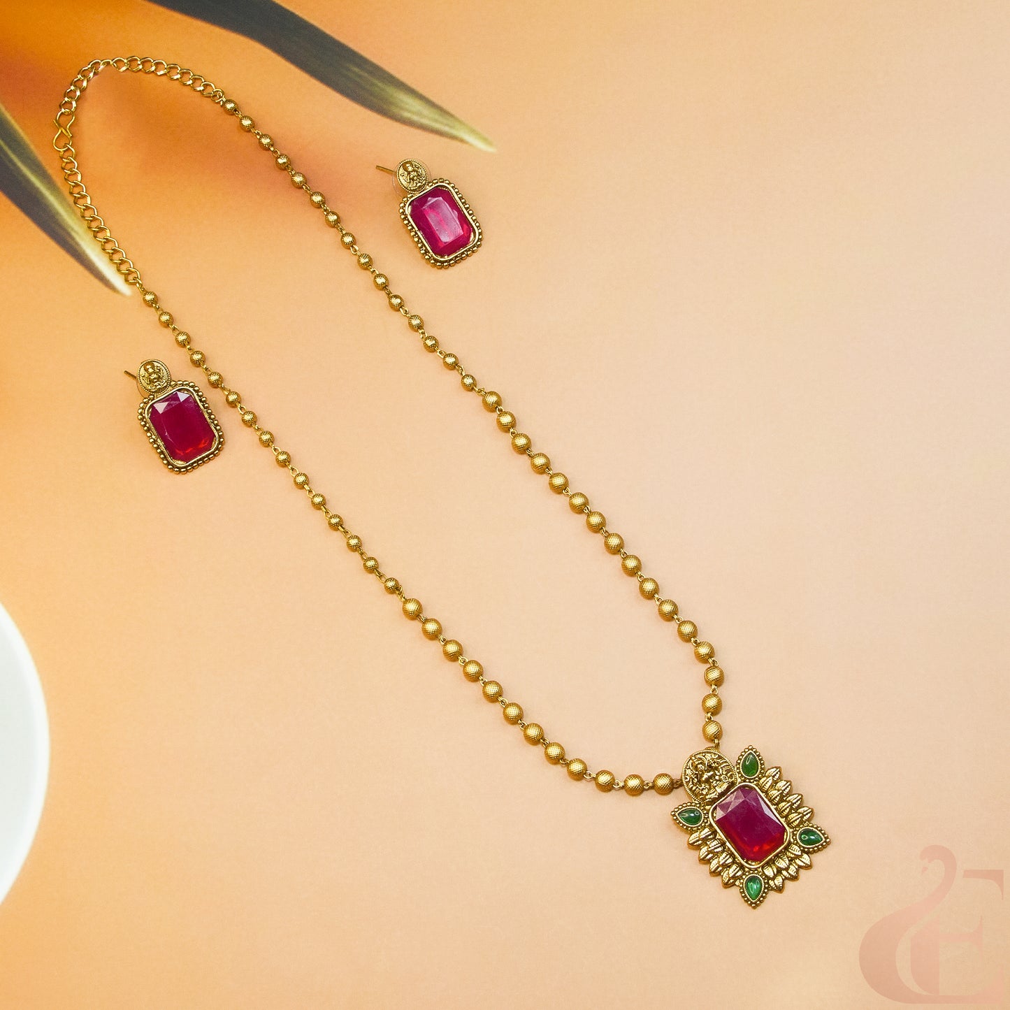 Side Angle Top view of Antique Temple Long Necklace & Earrings Ruby Green stones