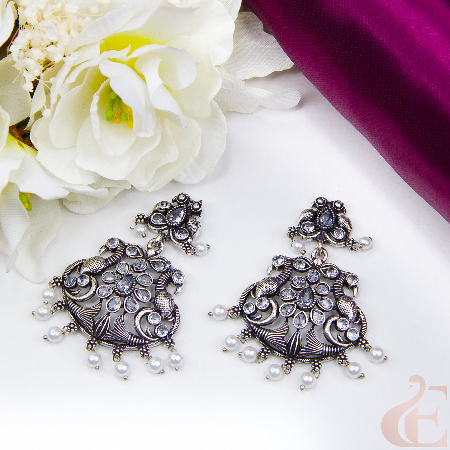 Top view of Elegant Oxidised silver earrings white Stone 11