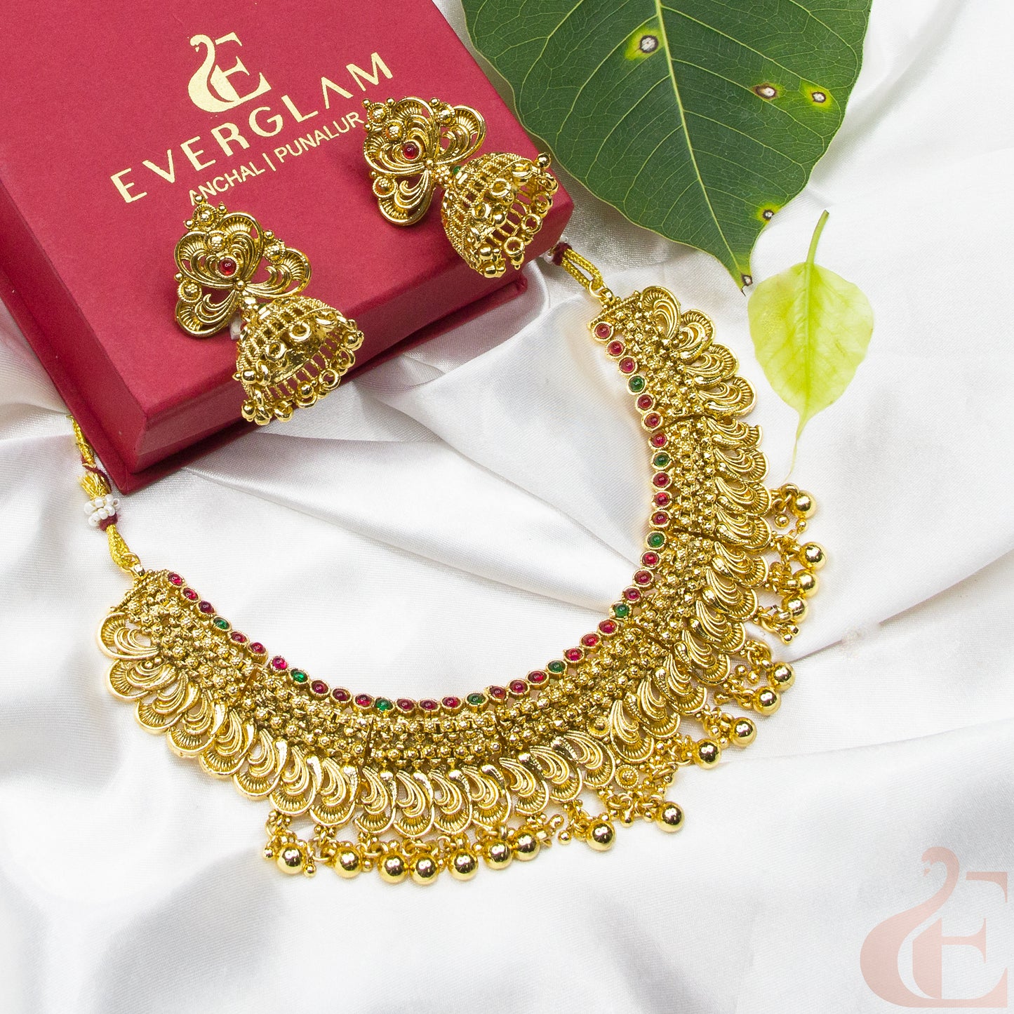 Side angle Top view of Gold Plated Necklace & Jhumka green ruby stones
