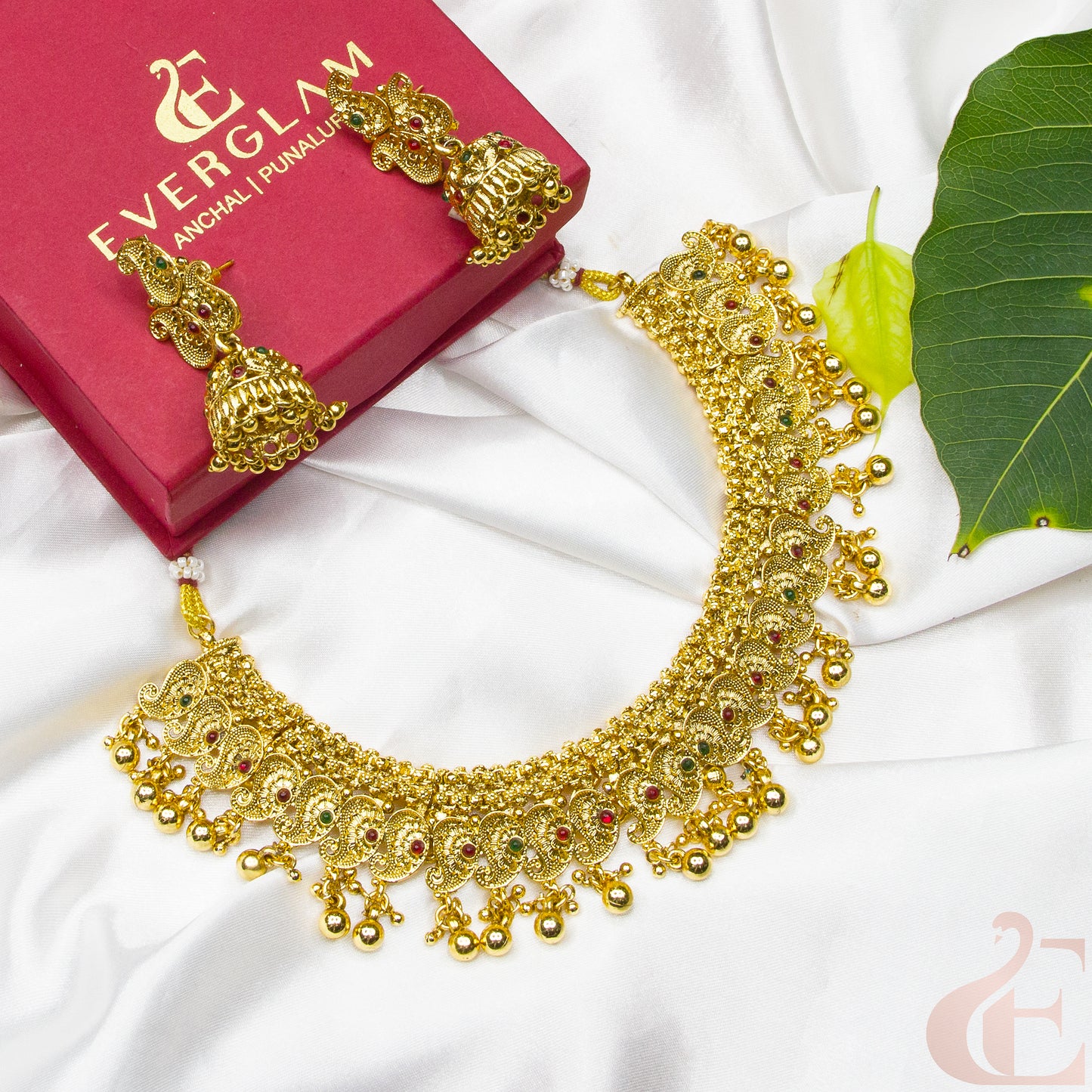 Top view of Gold Plated Necklace & Jhumka green ruby stones