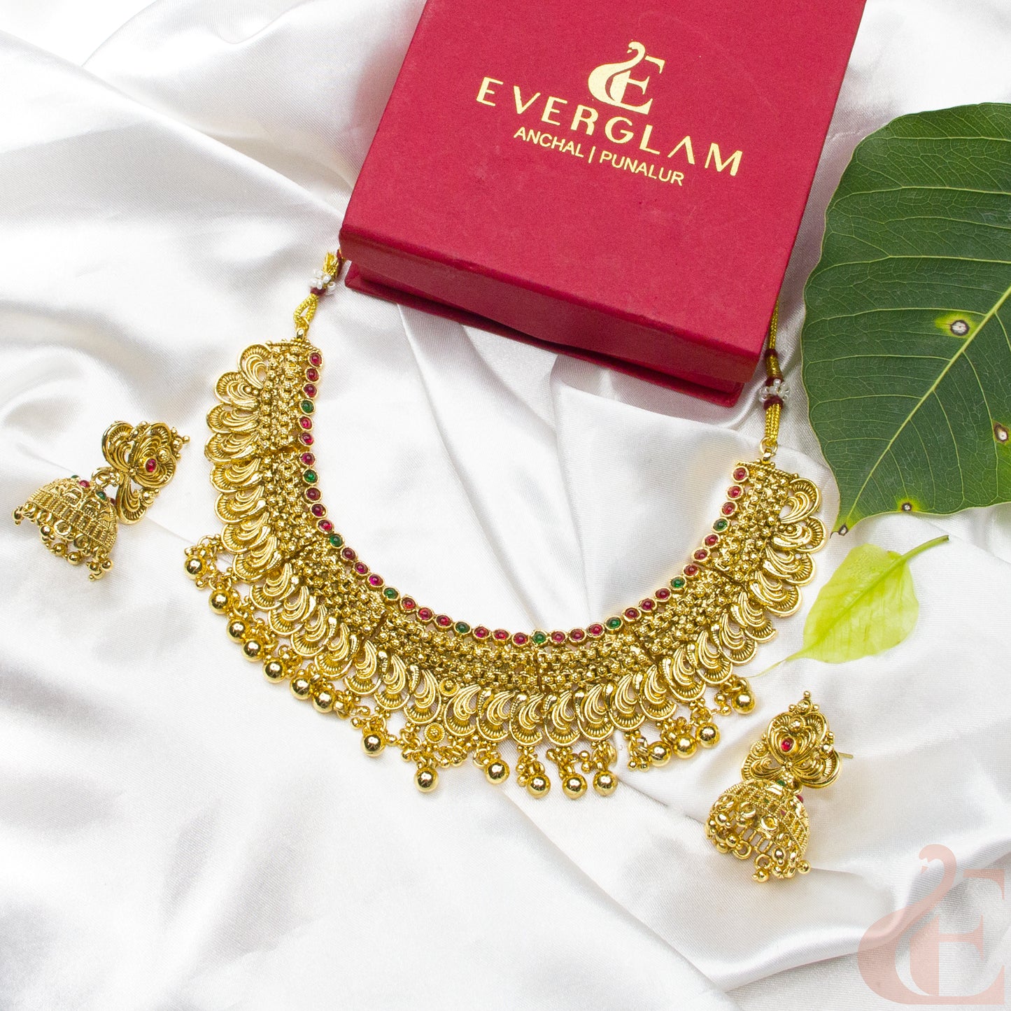 Side angle Top view of Gold Plated Necklace & Jhumka ruby green stones