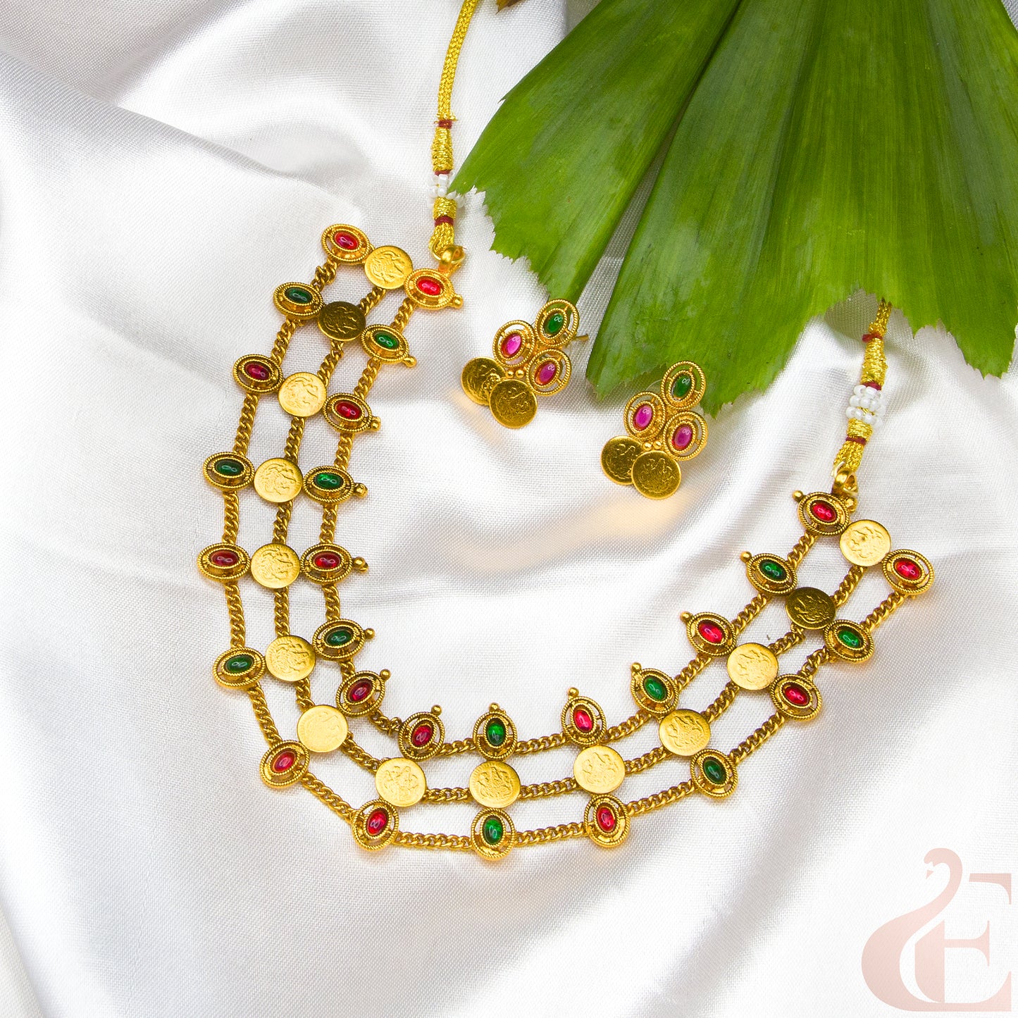 Top view of Kemp Three Layer With Lakshmi Coin Neckpiece Ruby Green stones
