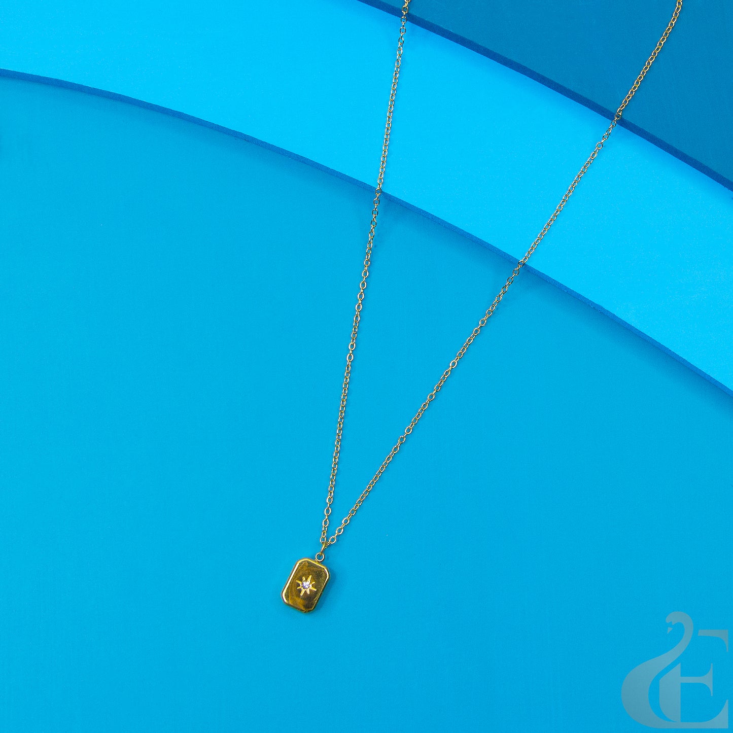 Top view of Minimal and dainty star charm necklace