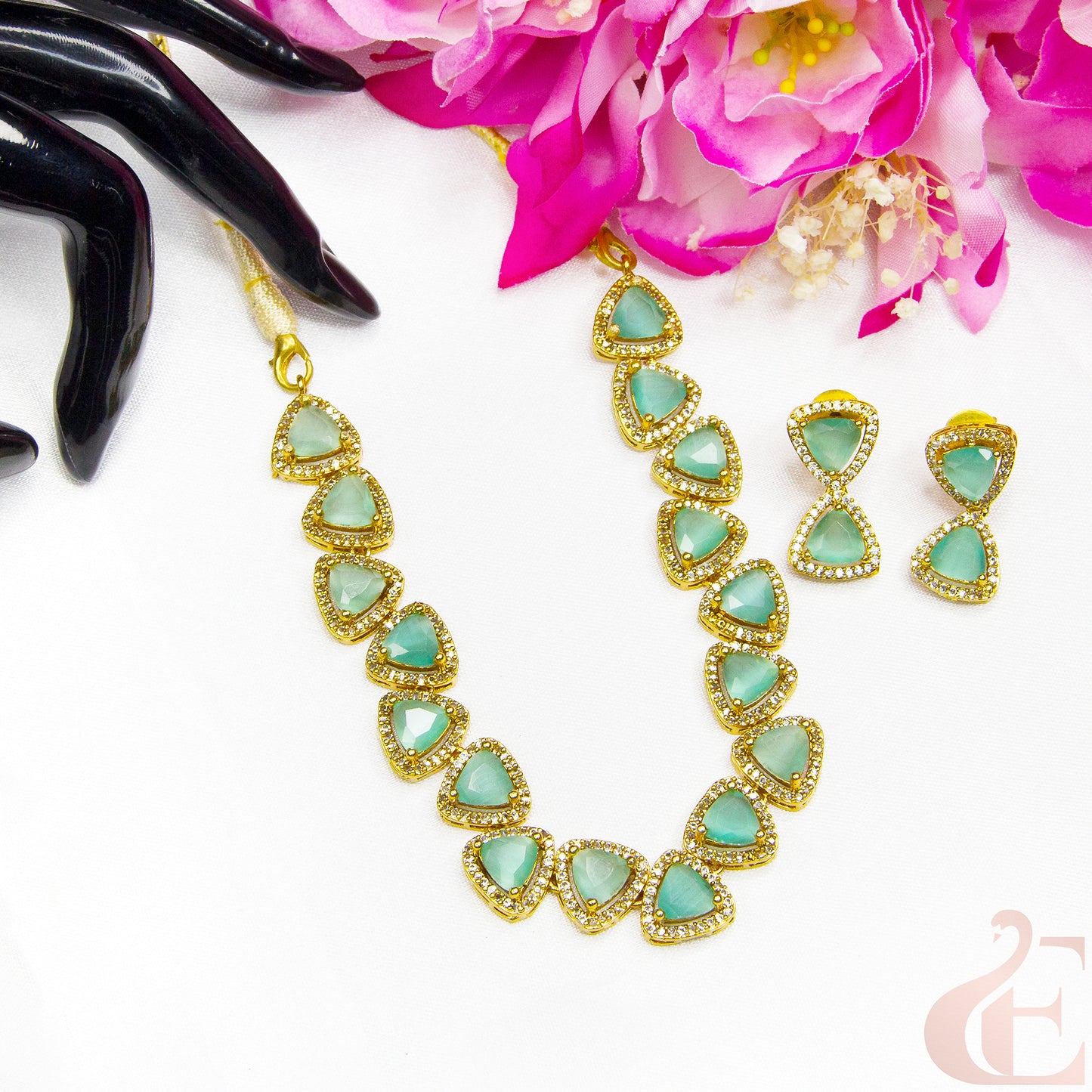 Top view of Premium AD Gold Plated Necklace & Earrings , Green stones