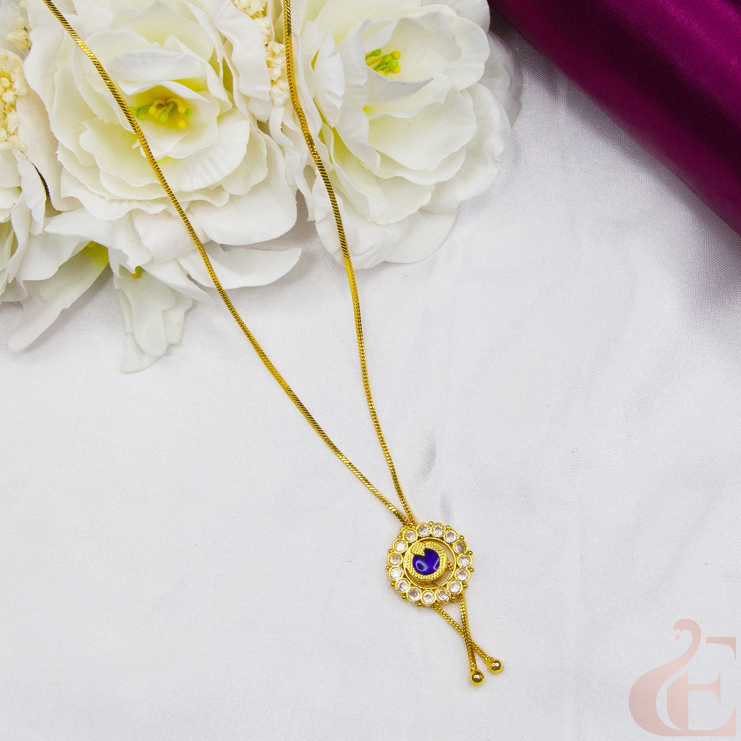 Top view of Round Design Gold Look Palakka Pendant Necklace , Blue white stones