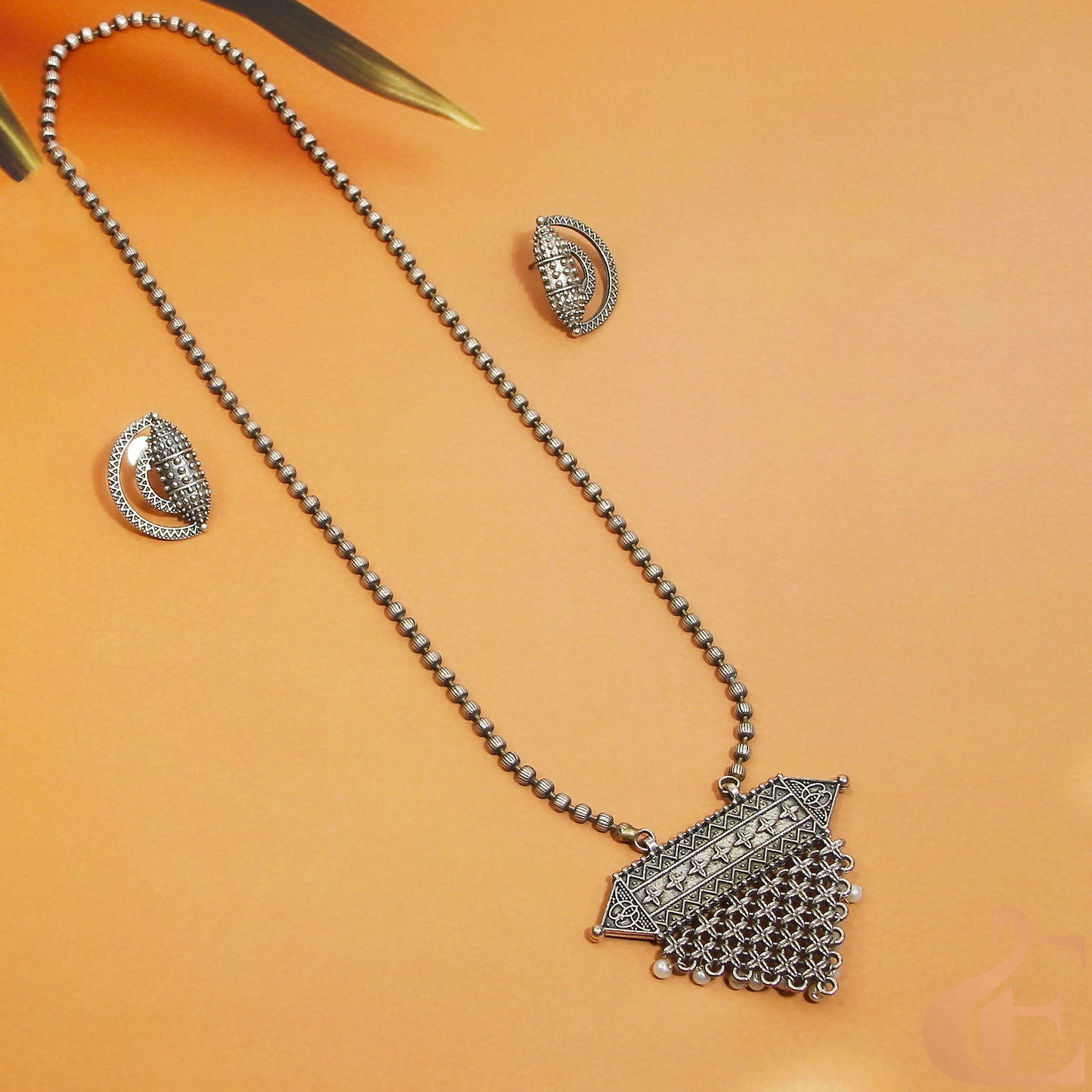 Top view of Silver Replica Long Necklace & Earrings