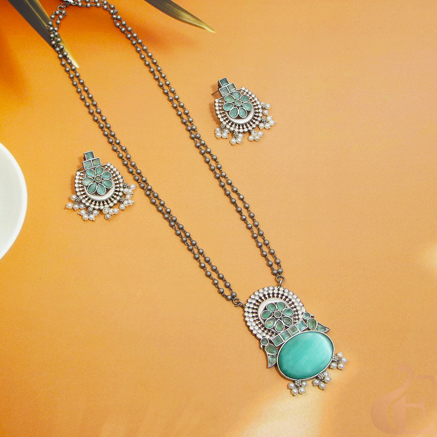 Top view of Silver Replica Long Necklace & Earrings Pista Green Stones