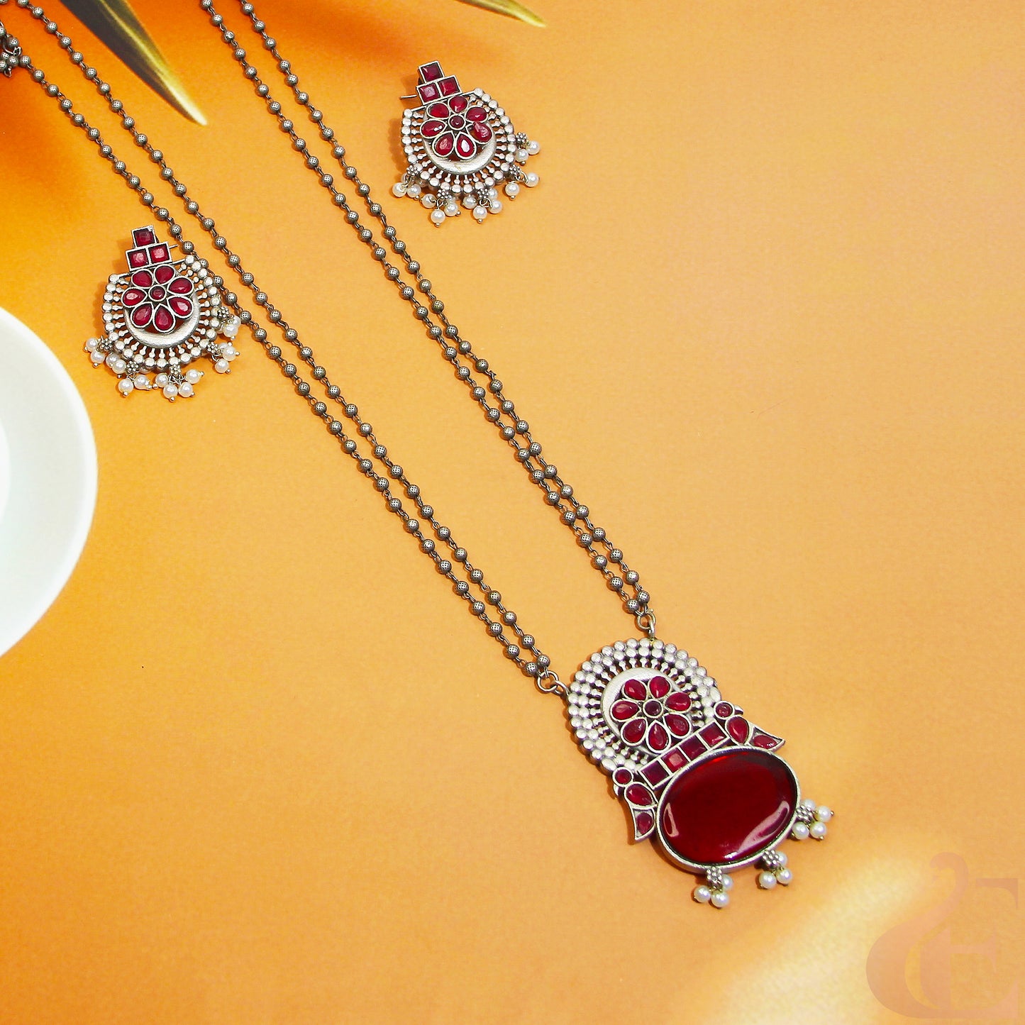 Top view of Silver Replica Long Necklace & Earrings Red Stones