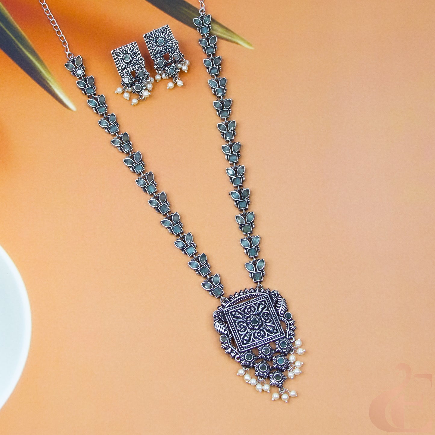 Top view of Silver Replica Long Necklace Set Olive Green stones