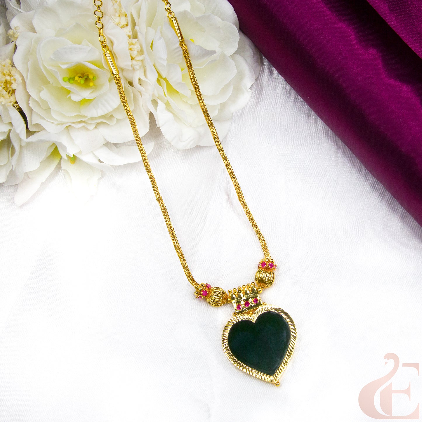 Top view of Traditional Kerala AD Palakka Heart Pendant Necklace Green & Ruby Stones