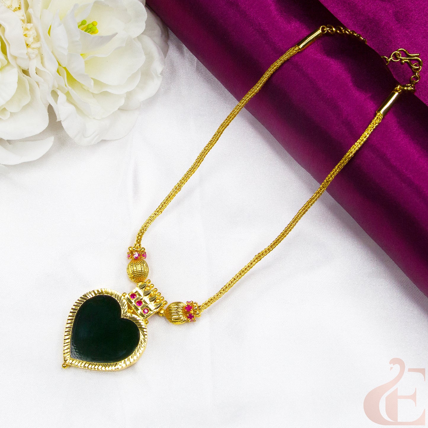 Top view of Traditional Kerala AD Palakka Heart Pendant Necklace Green & Ruby Stones