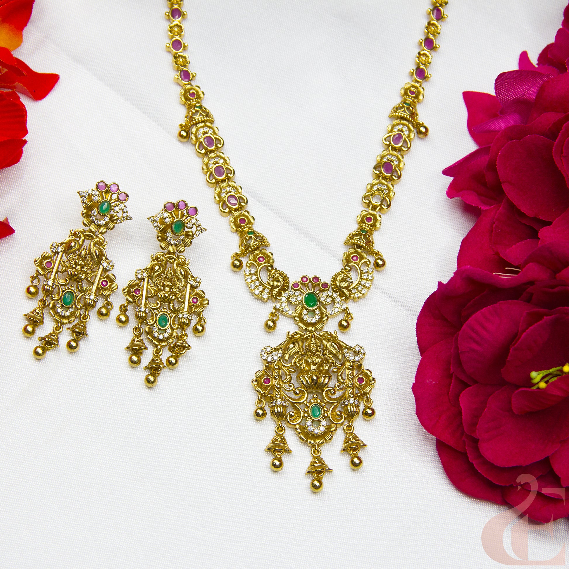Top view of AD Antique Necklace & earrings Ruby Green stones 