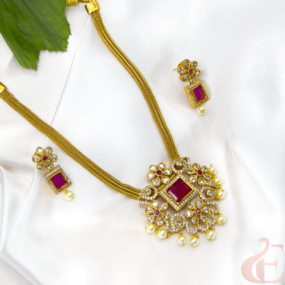 Top left side  view of AD_Ruby_Studded Antique Necklace_with matching earrings