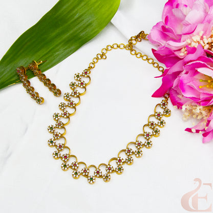 Top view of AD Stone Gold Plated Necklace  & Earrings , ruby green white stones 