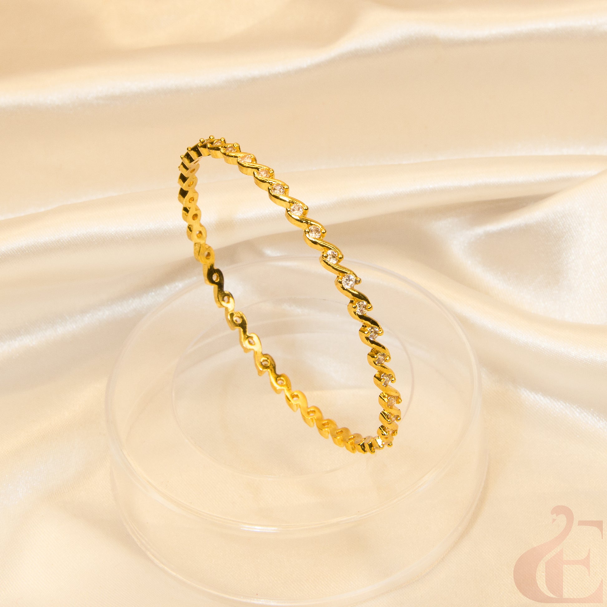 gold bangle with AD stone