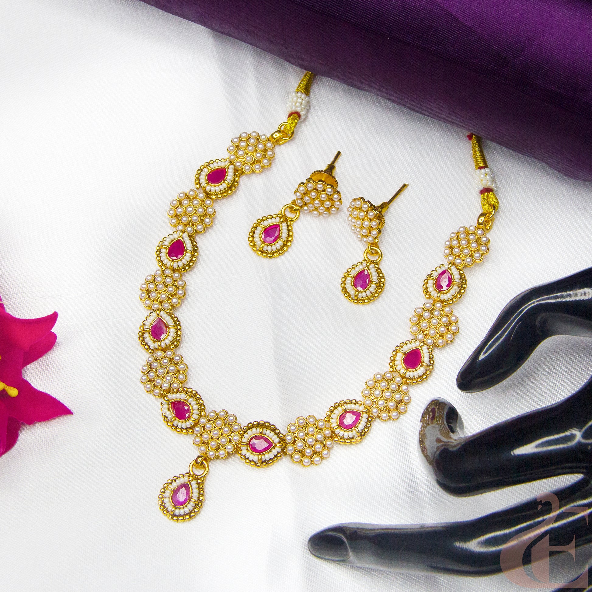 Top view of Antique Design Pearl Necklace & Earrings , Ruby stones 