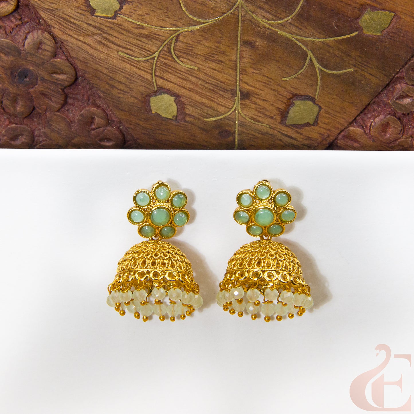Front view of Antique Earring Light weight Premium Jhumka Light green Stone