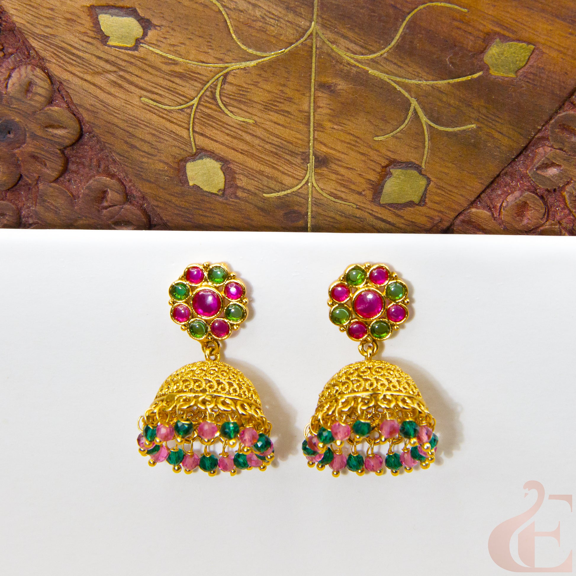 Front view of Antique Earring Light weight Premium Jhumka Ruby green stone