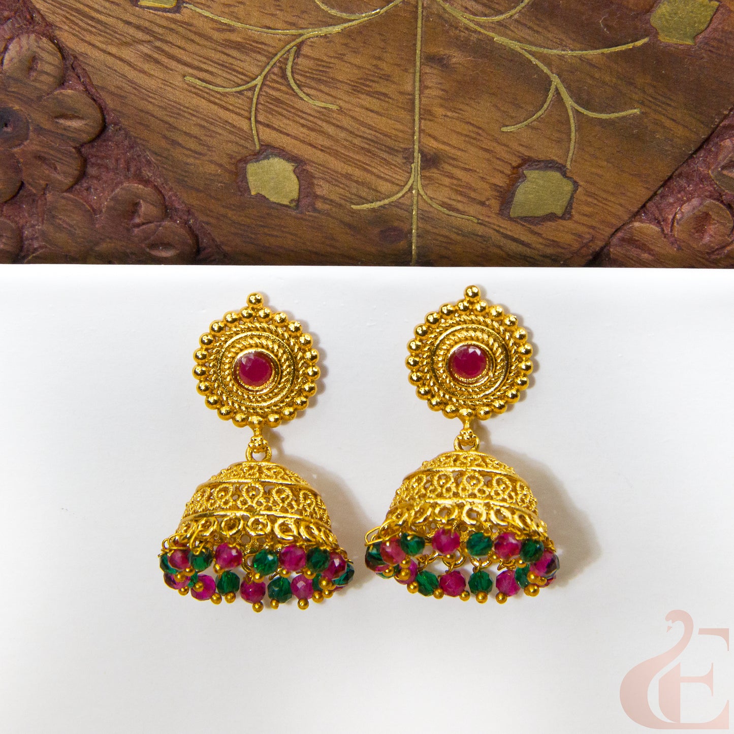 Front view of Antique Earring Light weight Premium Jhumka Ruby green stone