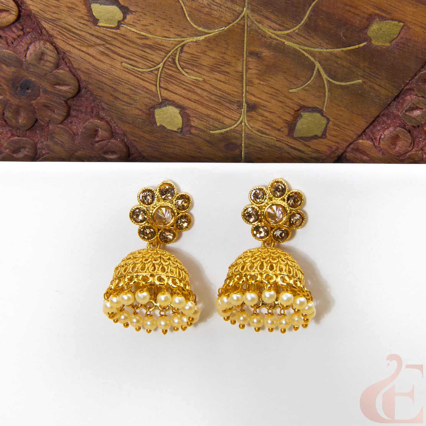 Front view of Antique Light weight Premium Jhumka White Stone