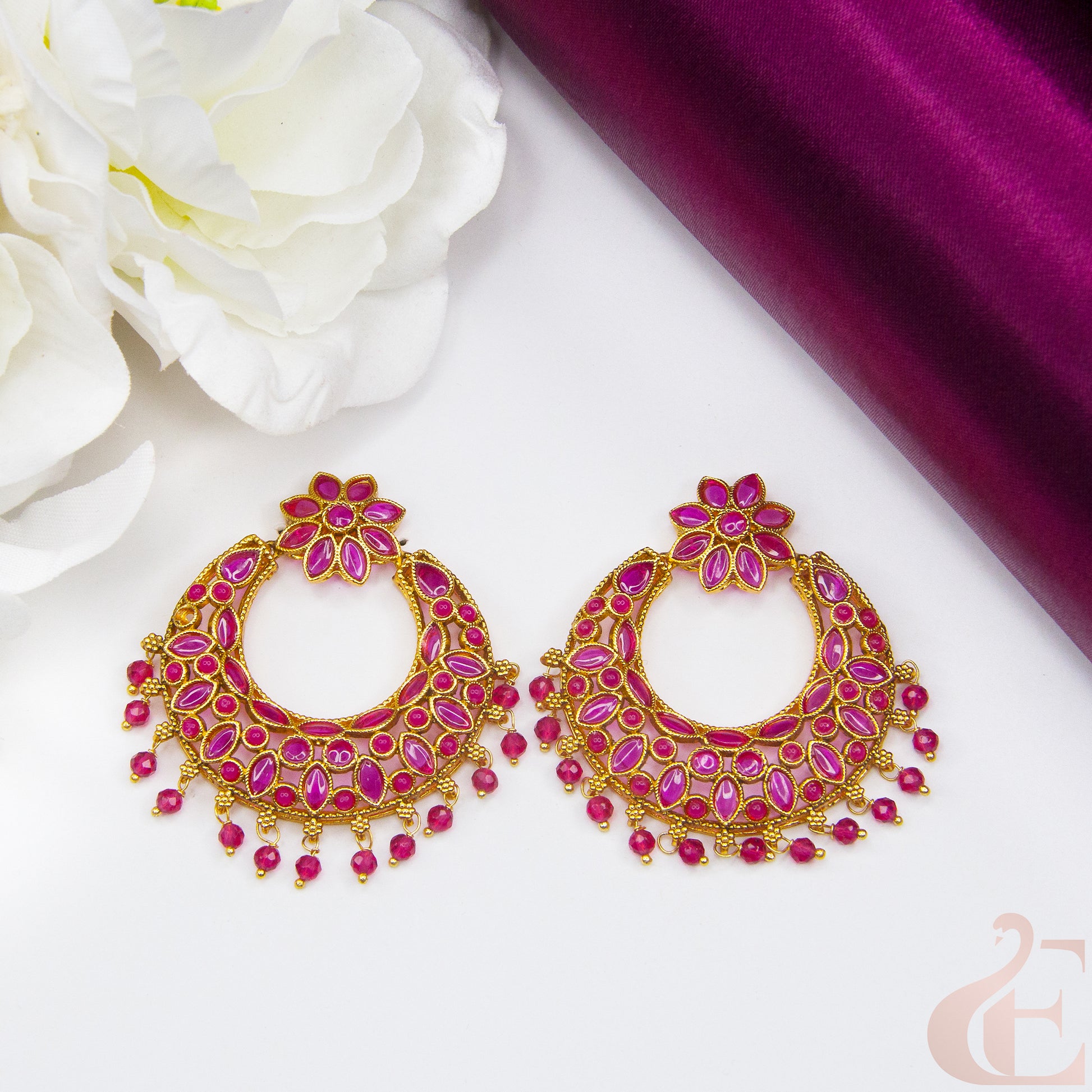 Top view of Antique Light weight Premium Earrings , ruby stones 