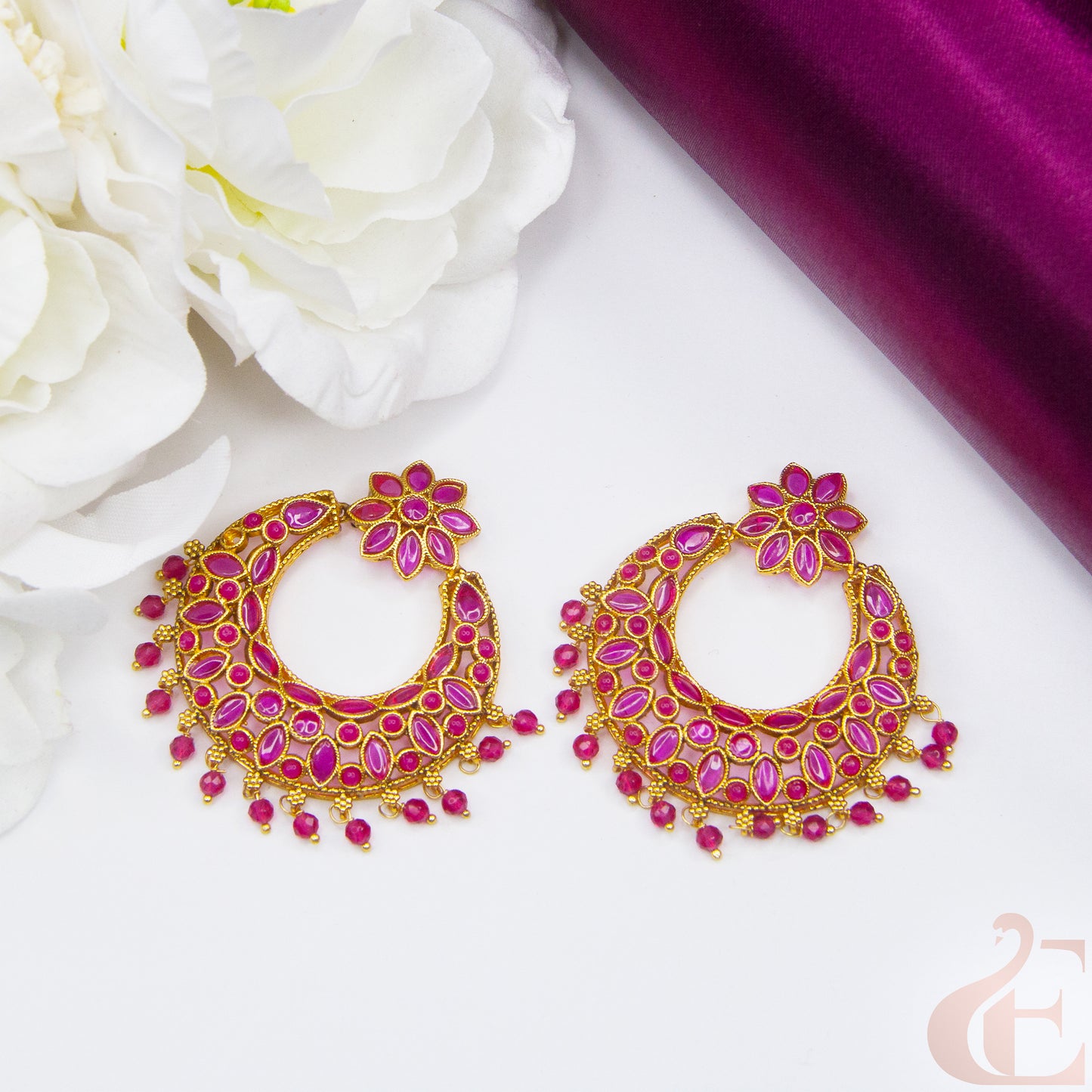 Side angle Top view of Antique Light weight Premium Earrings , ruby stones 