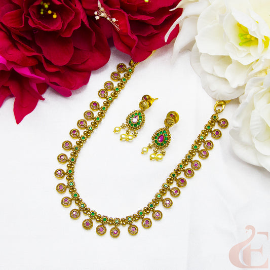 Top view of Antique Necklace & Earrings Ruby Green stones 