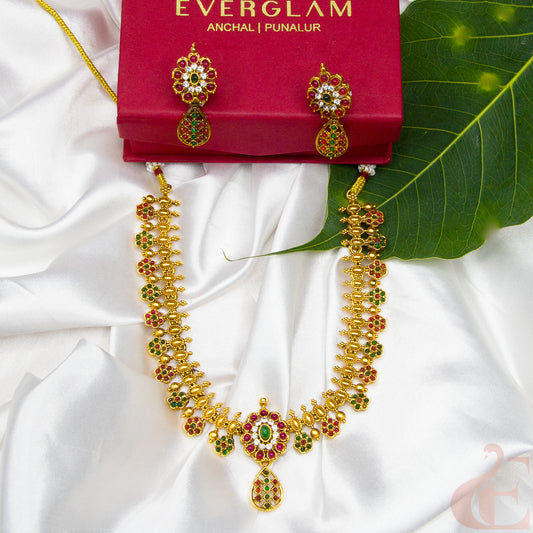 Top view of Antique Necklace & Earrings Ruby green white stones 