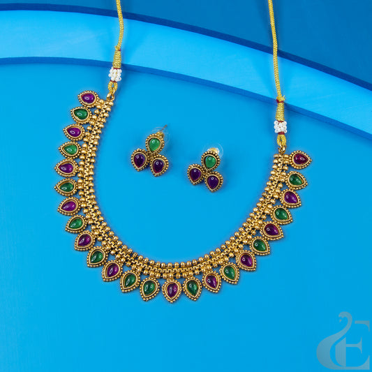 Top view of Antique Necklace & Earrings Ruby green stones 