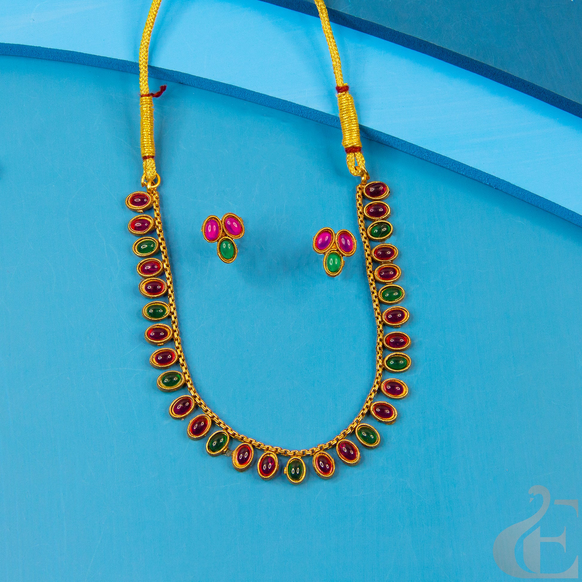 Top view of Antique Necklace & Earrings, Ruby Green stones