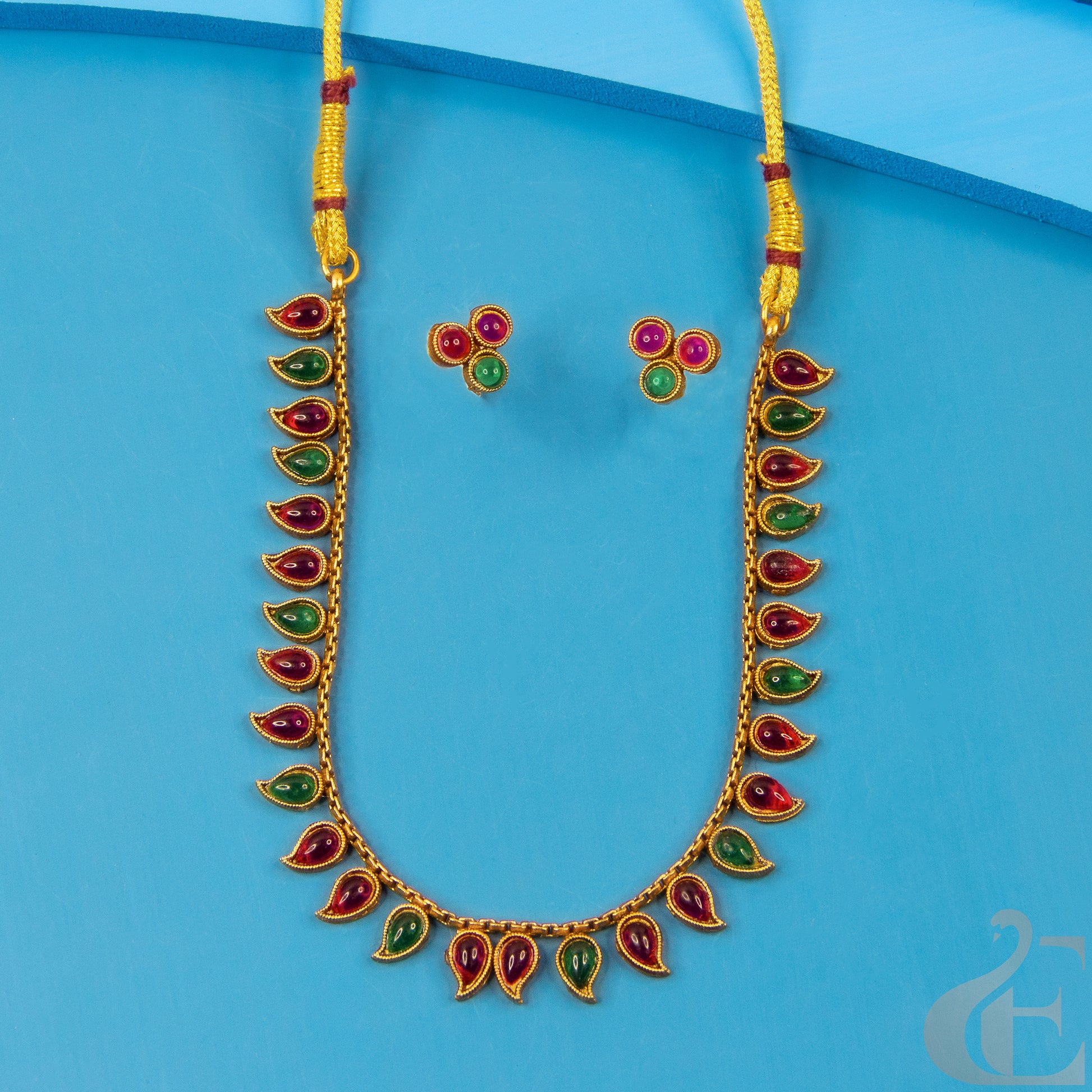 Top view of Antique Necklace & Earrings Ruby Green stones 