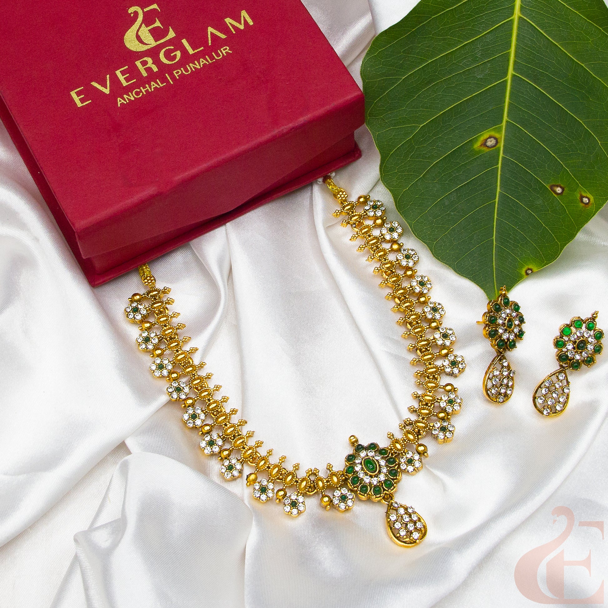 Side angle Top view of Antique Necklace & Earrings White Green stones 