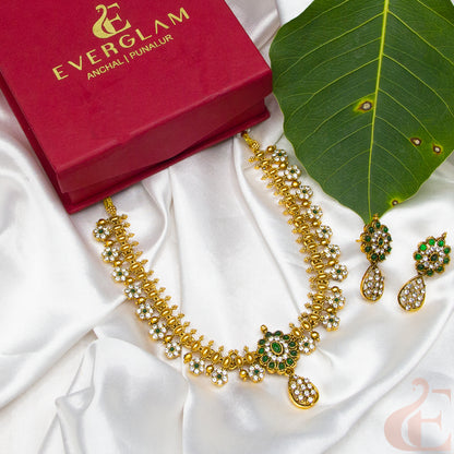 Side angle Top view of Antique Necklace & Earrings White Green stones 