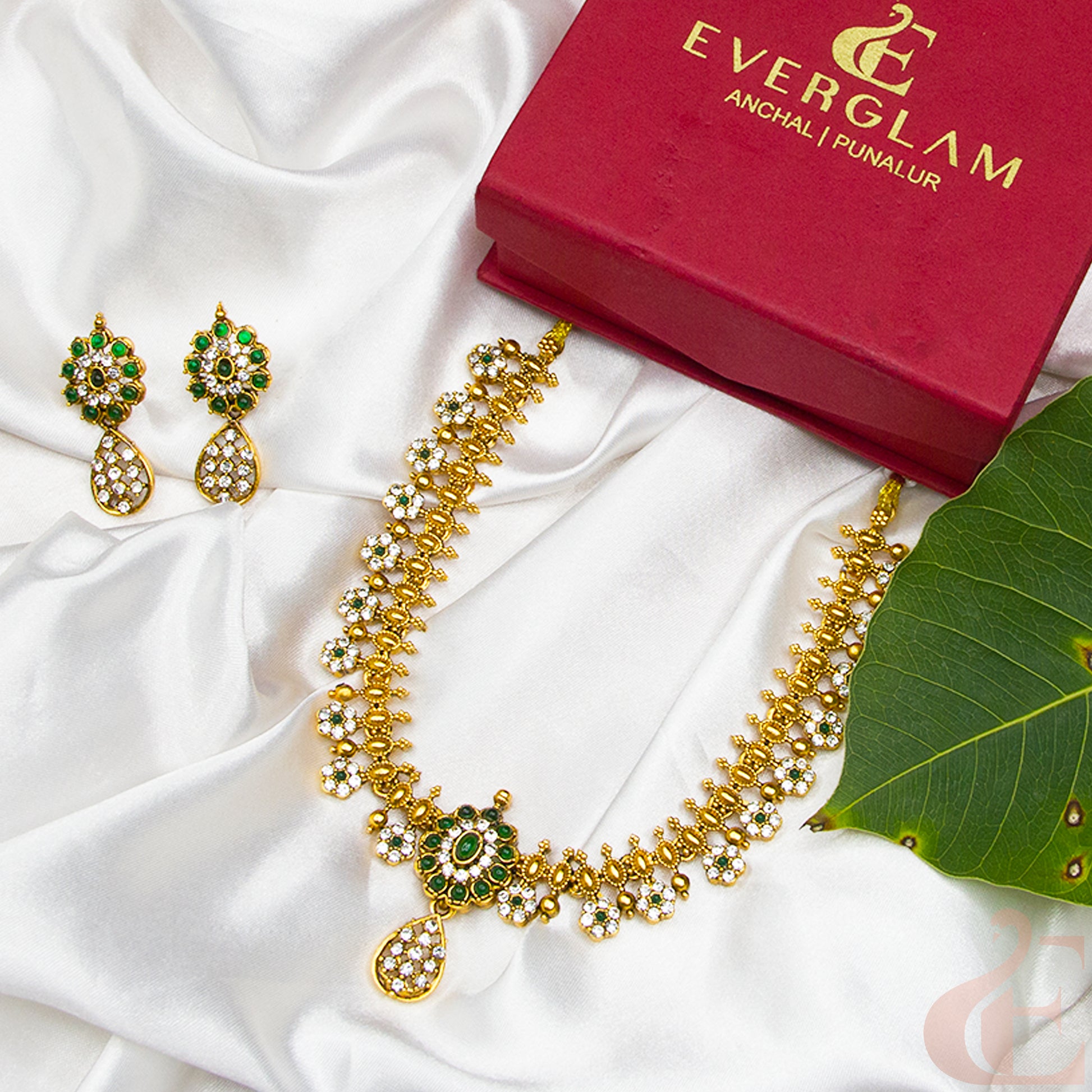 Side angle Top view of Antique Necklace & Earrings White Green stones 