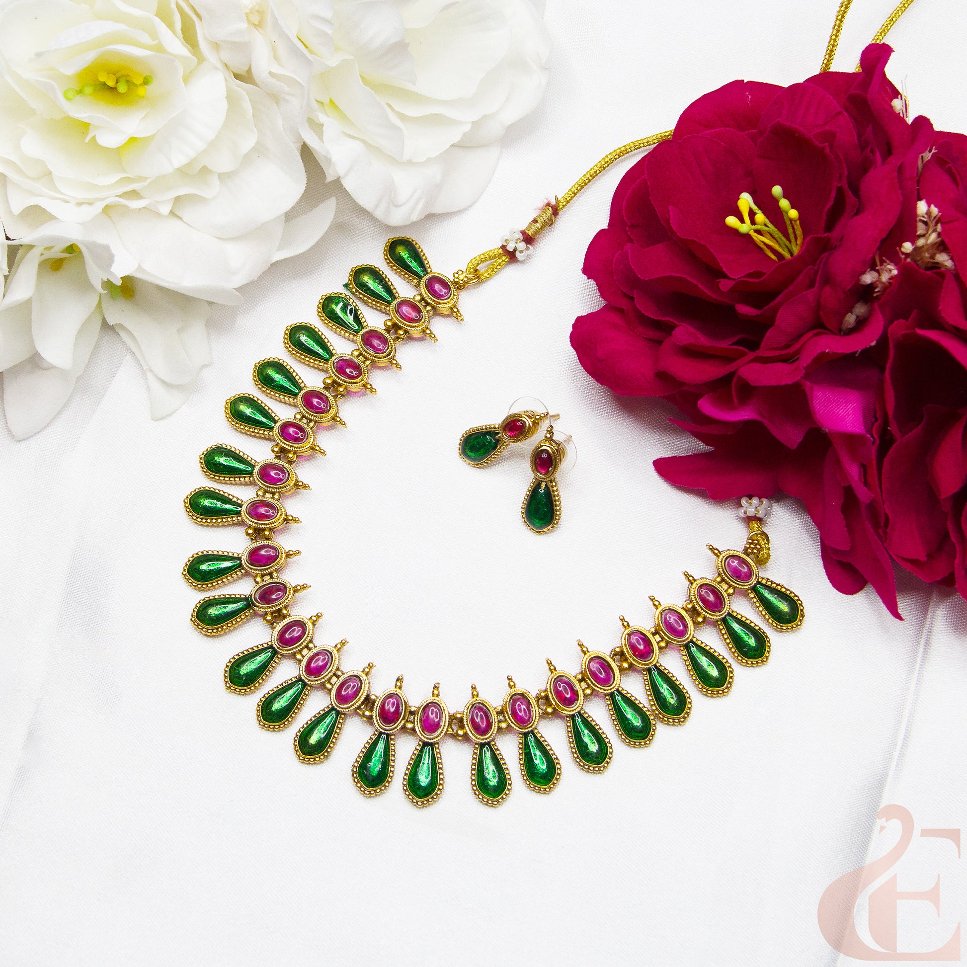 Top view of Antique Necklace & Earrings  ruby green stones 