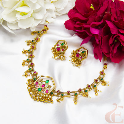 Top view of Antique Necklace & Earrings ruby green stones 