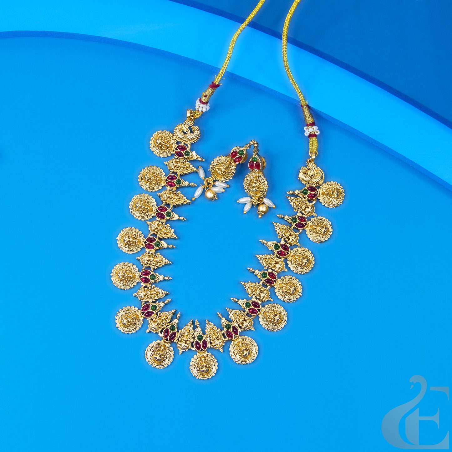 Top view of Antique Temple Necklace & Earrings Ruby green stones 