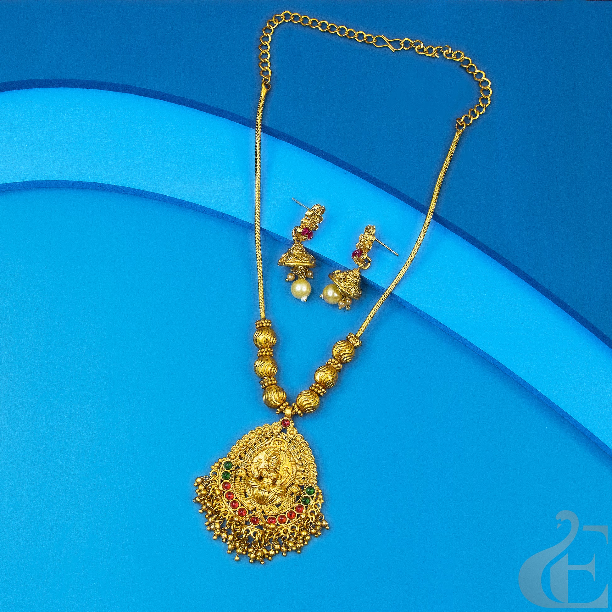 Top view of Antique Temple Necklace & Earrings Ruby green stones