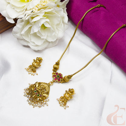Top view of Antique Temple Necklace & Earrings Ruby Green stones 