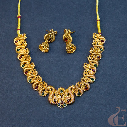 Top view of Antique pecock Necklace & Earrings Ruby green stones 