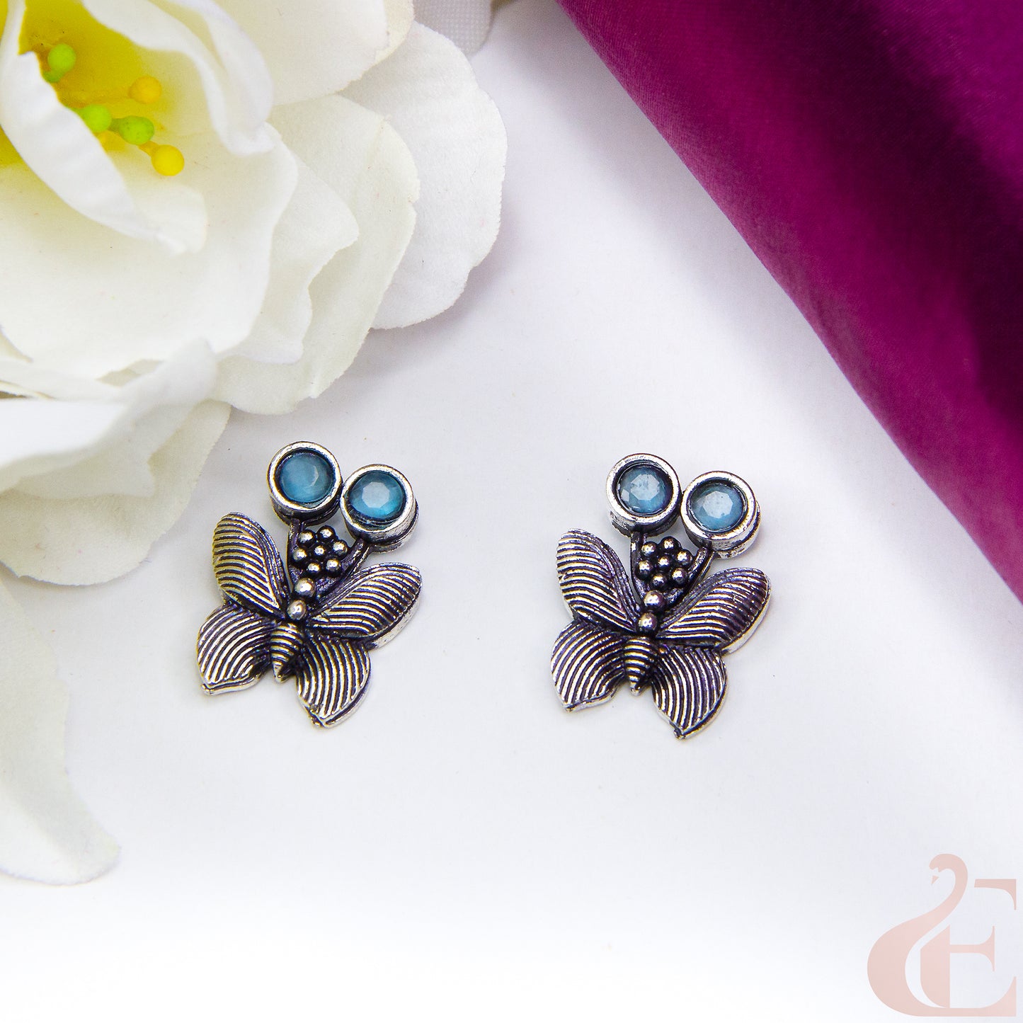 Top view of Butterfly Oxidised Stud Earrings Light Blue stone 