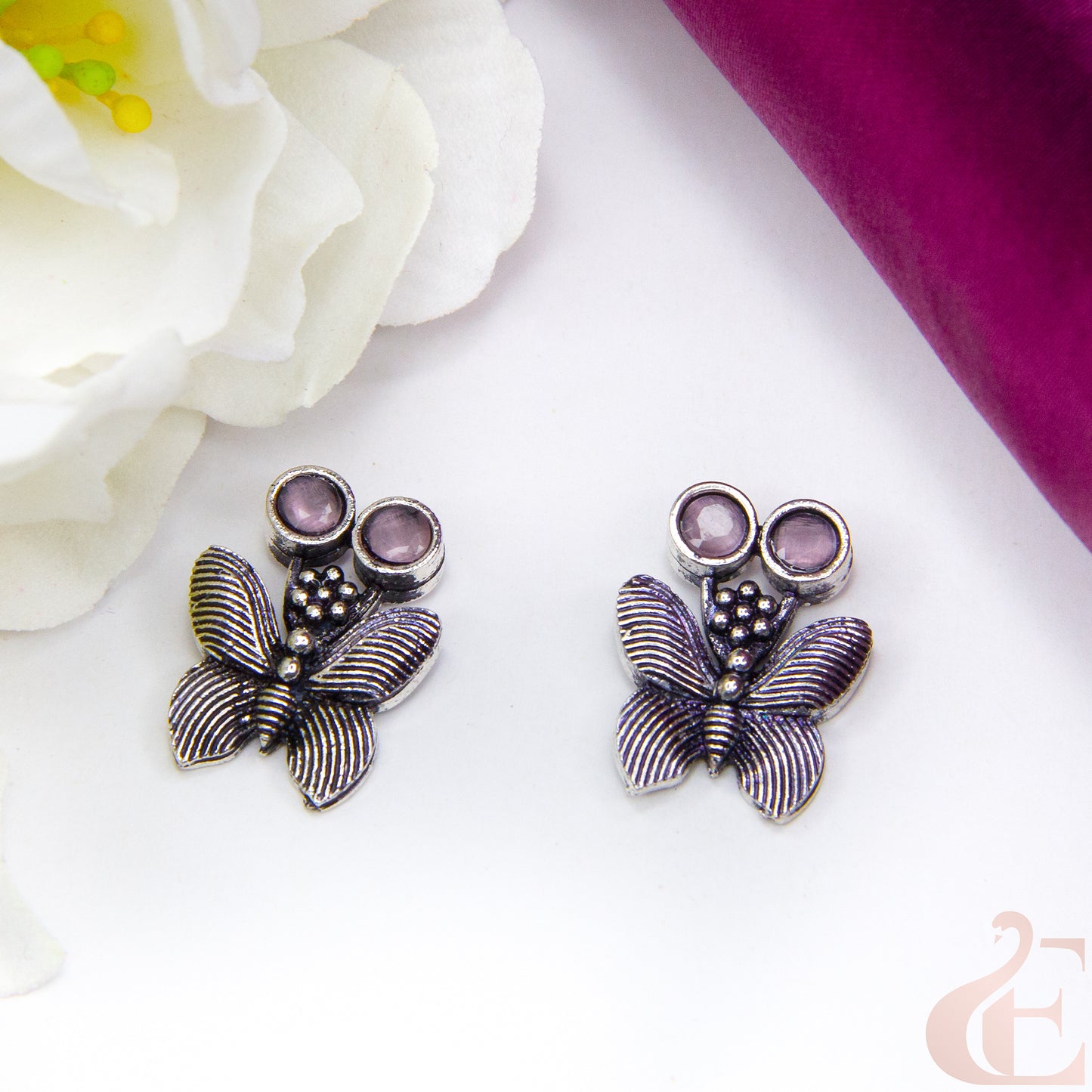 Top view of Butterfly Oxidised Stud Earrings Light Pink stone 