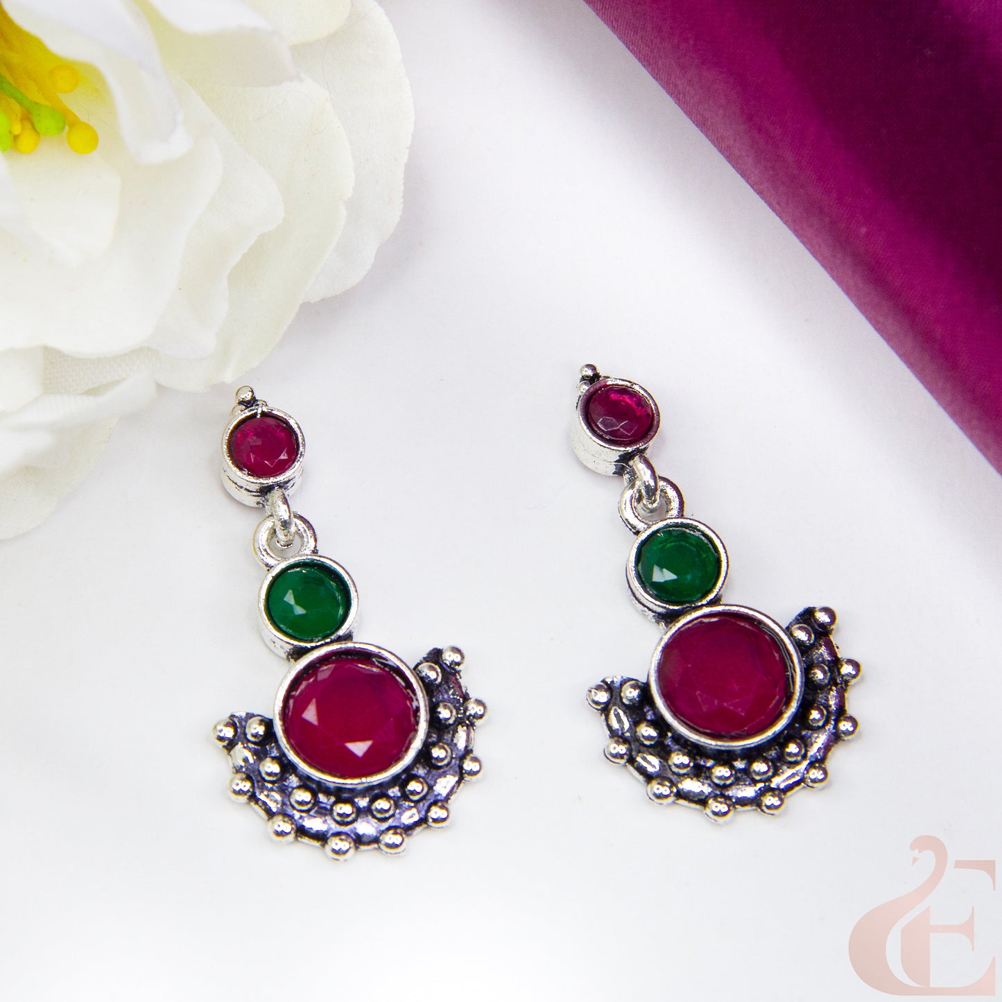 Top view of Elegant Oxidised Silver Earrings Ruby Green stone 