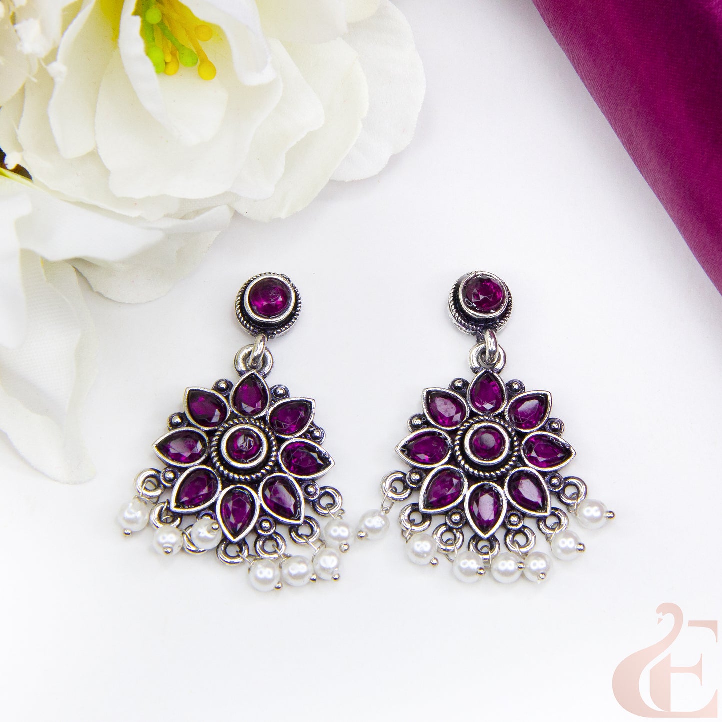 Top view of Elegant Oxidised Silver Floral Earrings Rani Pink Stone 15