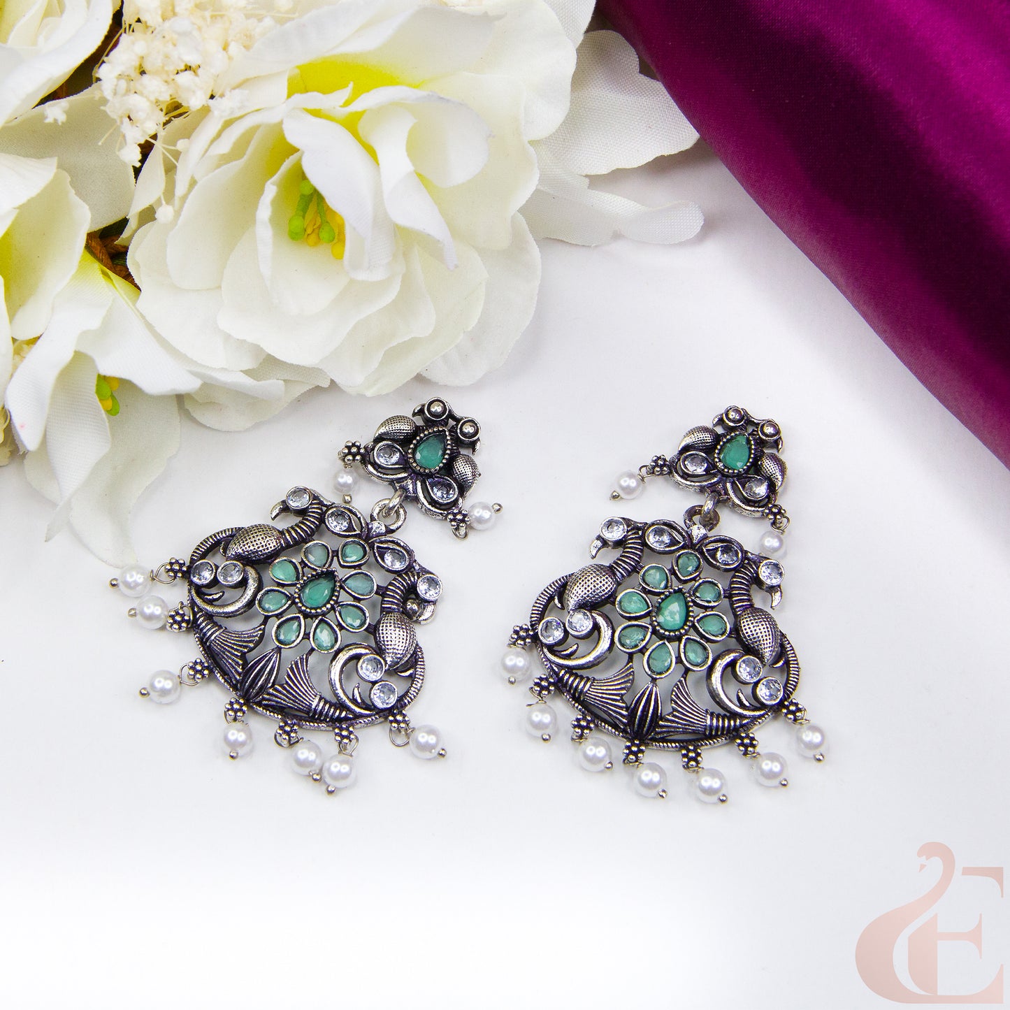 Top view of Elegant Oxidised silver earrings Light Green  Stone 