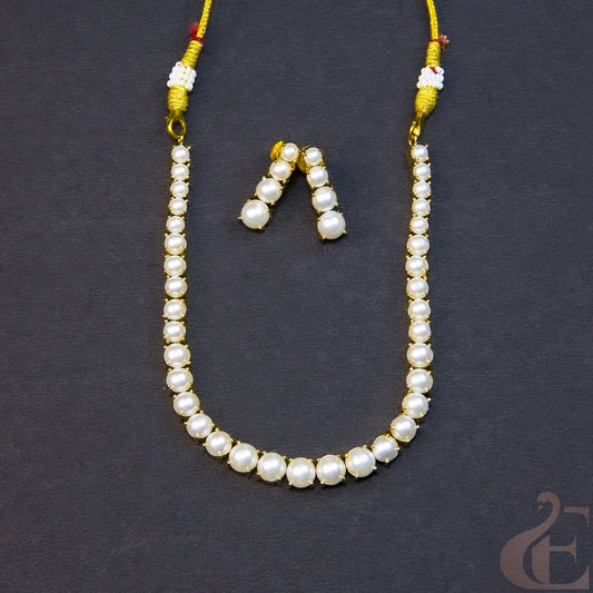 Top view of Ethnic Antique Gold Plated White Pearl Premium Necklace and Earrings 